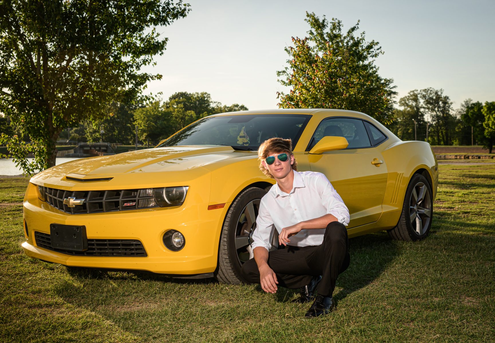 Senior portrait session with car for North Alabama graduate